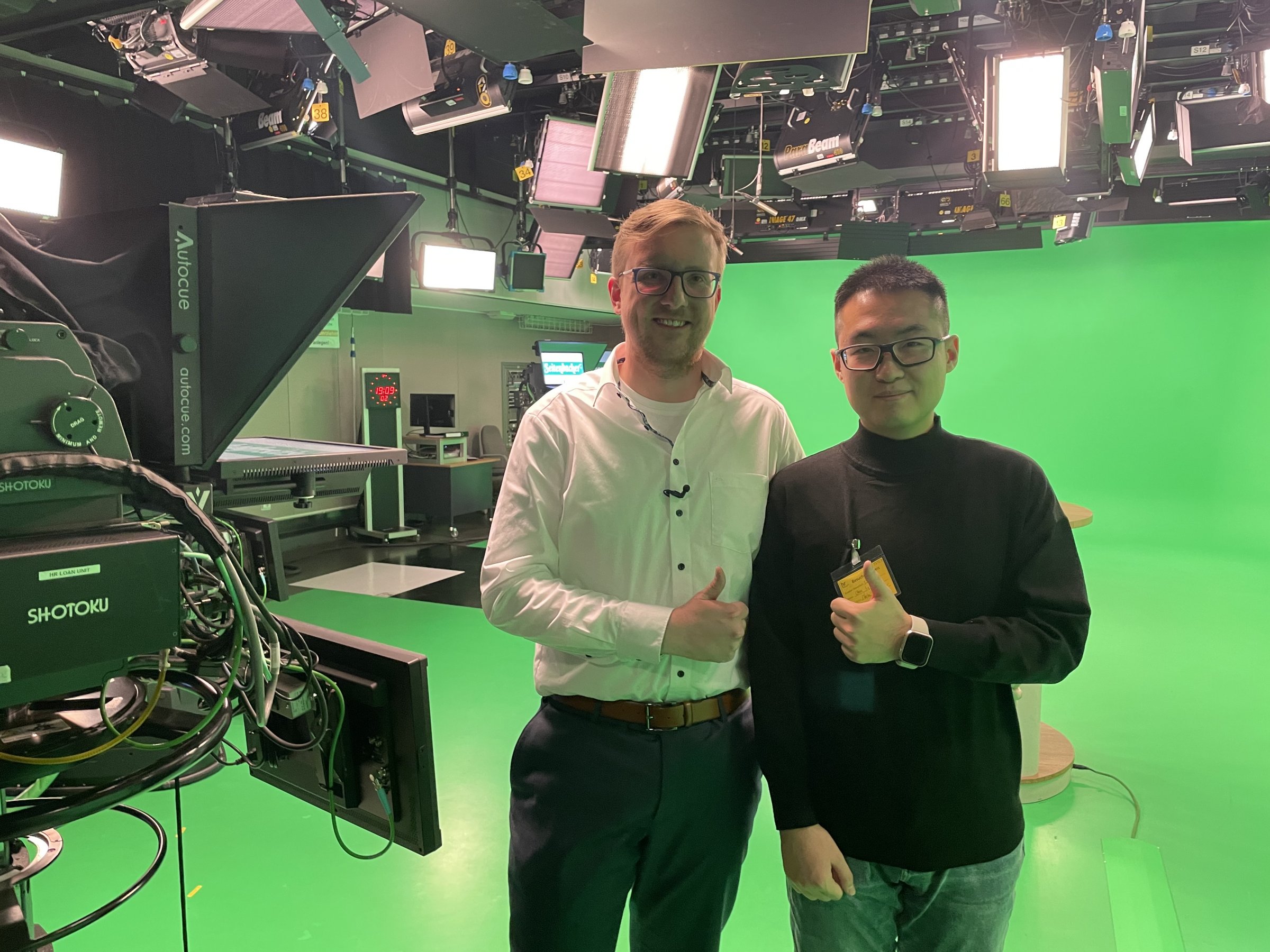 Markus Schlott and Chen Li in HR TV studio